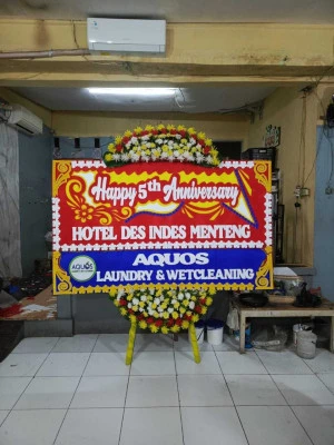 Papan Bunga di Harapan Mulia